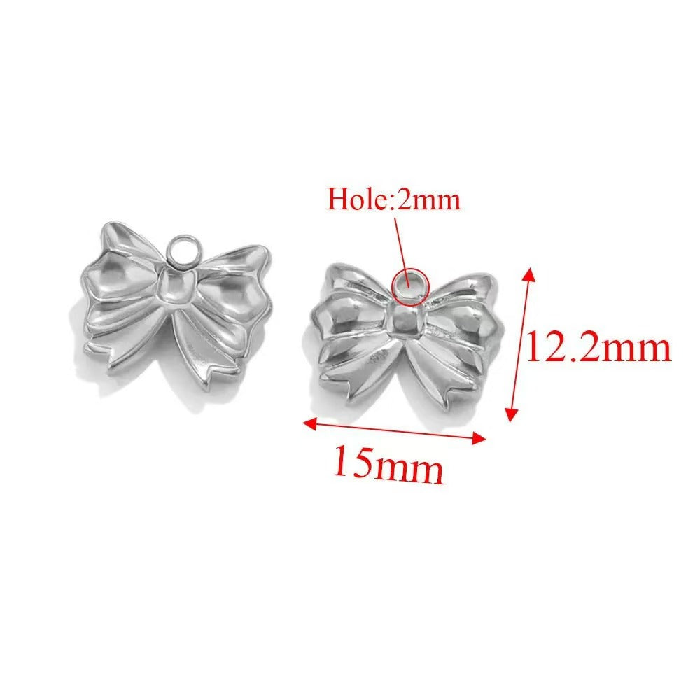 Stainless steel bow - shaped jewelry accessories, DIY necklaces, bracelets, and earrings. There are 5 trendy electroplated bow - shaped pendants.