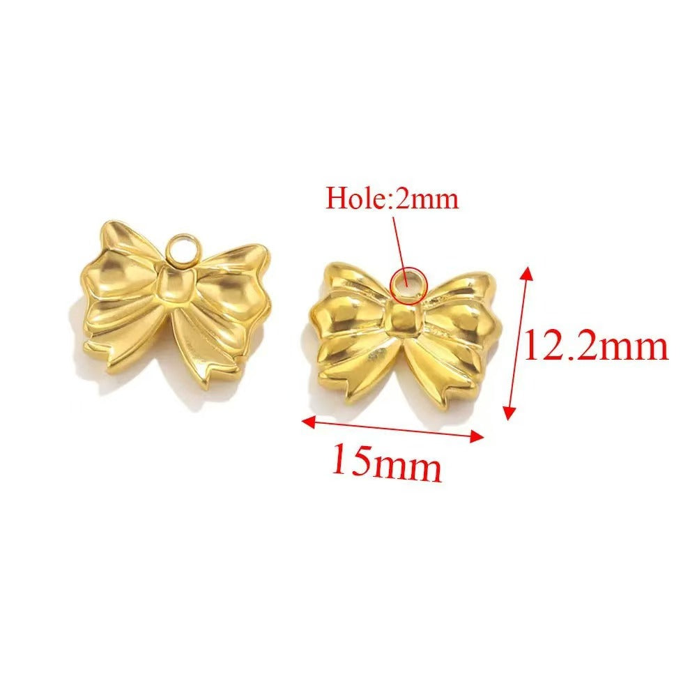 Stainless steel bow - shaped jewelry accessories, DIY necklaces, bracelets, and earrings. There are 5 trendy electroplated bow - shaped pendants.