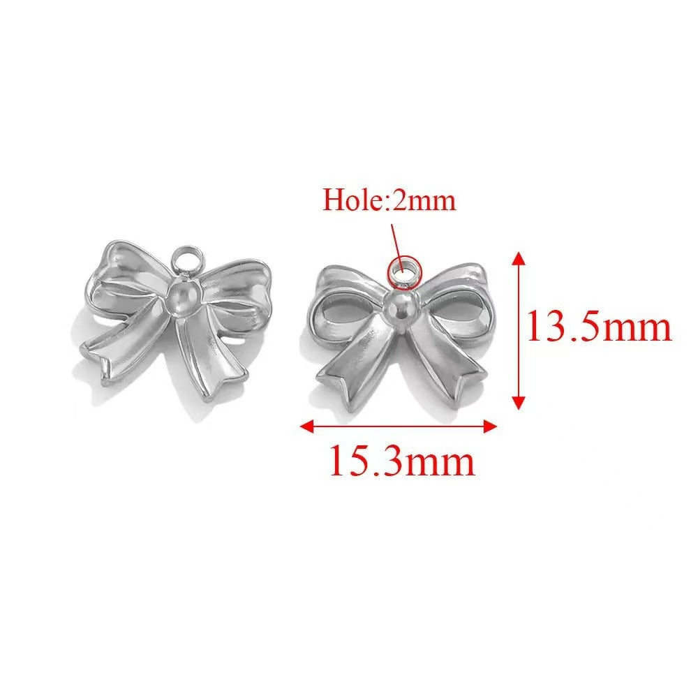 Stainless steel bow - shaped jewelry accessories, DIY necklaces, bracelets, and earrings. There are 5 trendy electroplated bow - shaped pendants.