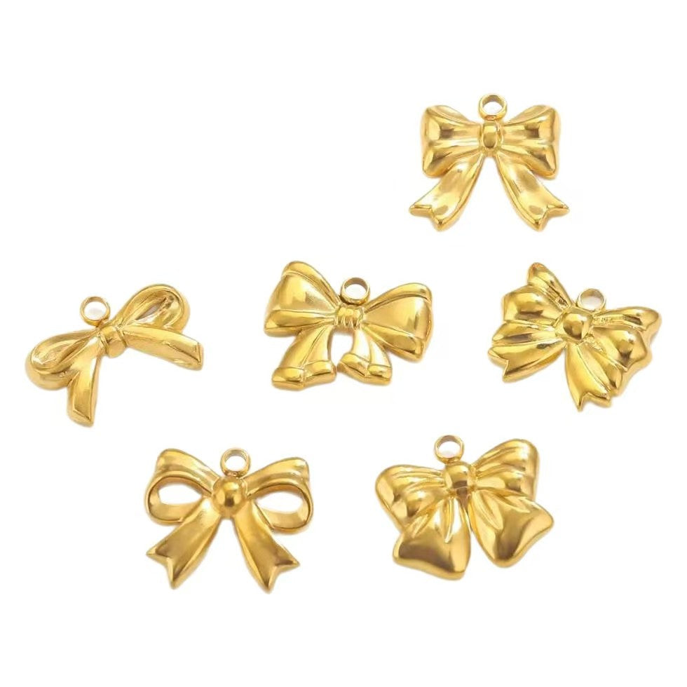 Stainless steel bow - shaped jewelry accessories, DIY necklaces, bracelets, and earrings. There are 5 trendy electroplated bow - shaped pendants.