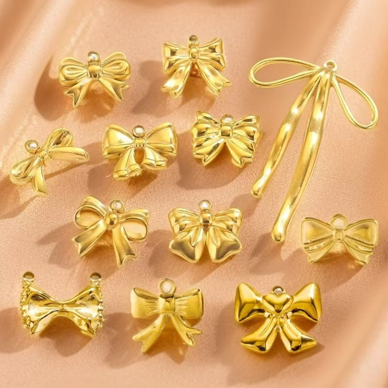 Stainless steel bow - shaped jewelry accessories, DIY necklaces, bracelets, and earrings. There are 5 trendy electroplated bow - shaped pendants.