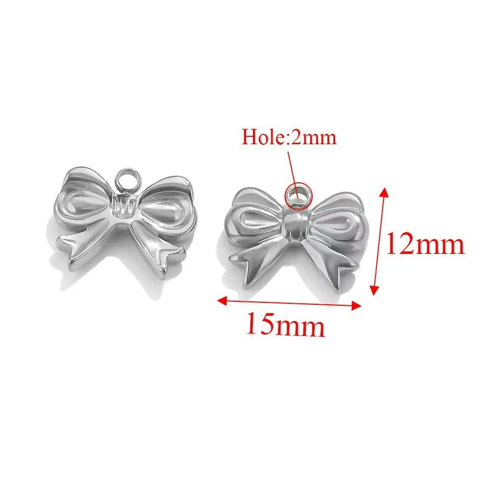 Stainless steel bow - shaped jewelry accessories, DIY necklaces, bracelets, and earrings. There are 5 trendy electroplated bow - shaped pendants.