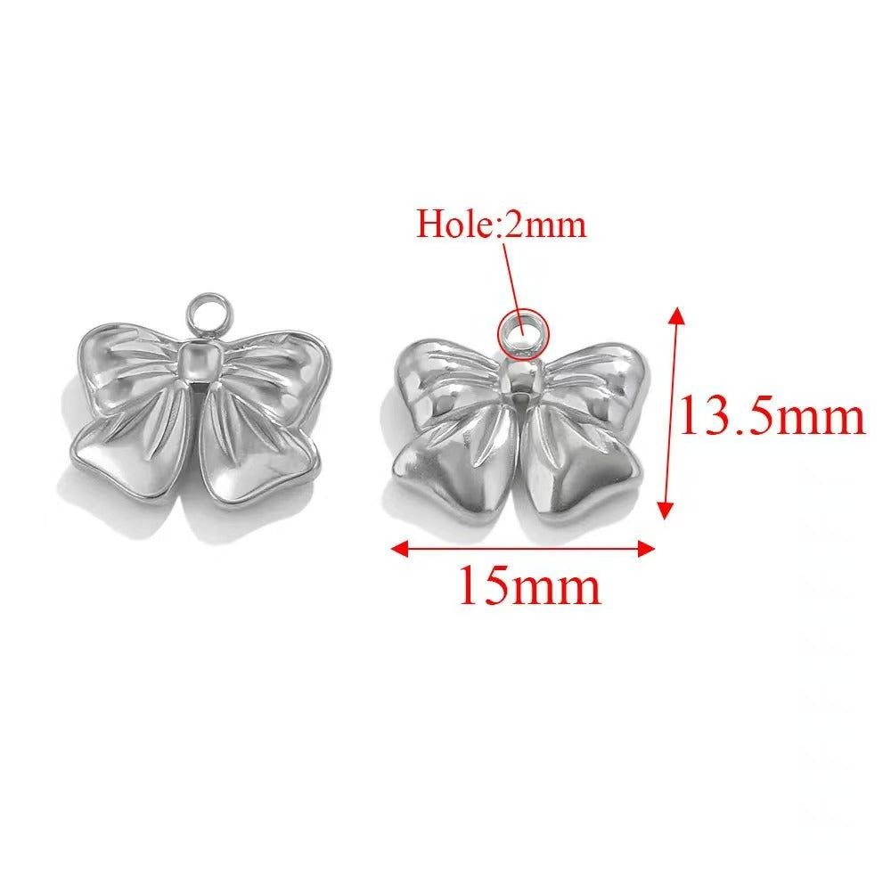 Stainless steel bow - shaped jewelry accessories, DIY necklaces, bracelets, and earrings. There are 5 trendy electroplated bow - shaped pendants.