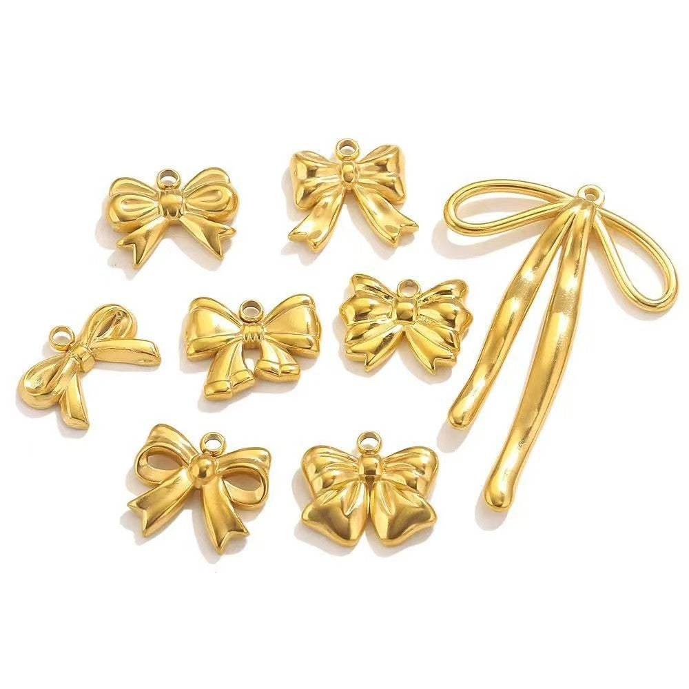 Stainless steel bow - shaped jewelry accessories, DIY necklaces, bracelets, and earrings. There are 5 trendy electroplated bow - shaped pendants.