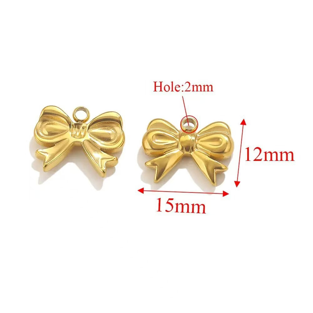 Stainless steel bow - shaped jewelry accessories, DIY necklaces, bracelets, and earrings. There are 5 trendy electroplated bow - shaped pendants.