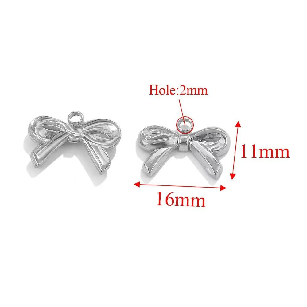 Stainless steel bow - shaped jewelry accessories, DIY necklaces, bracelets, and earrings. There are 5 trendy electroplated bow - shaped pendants.